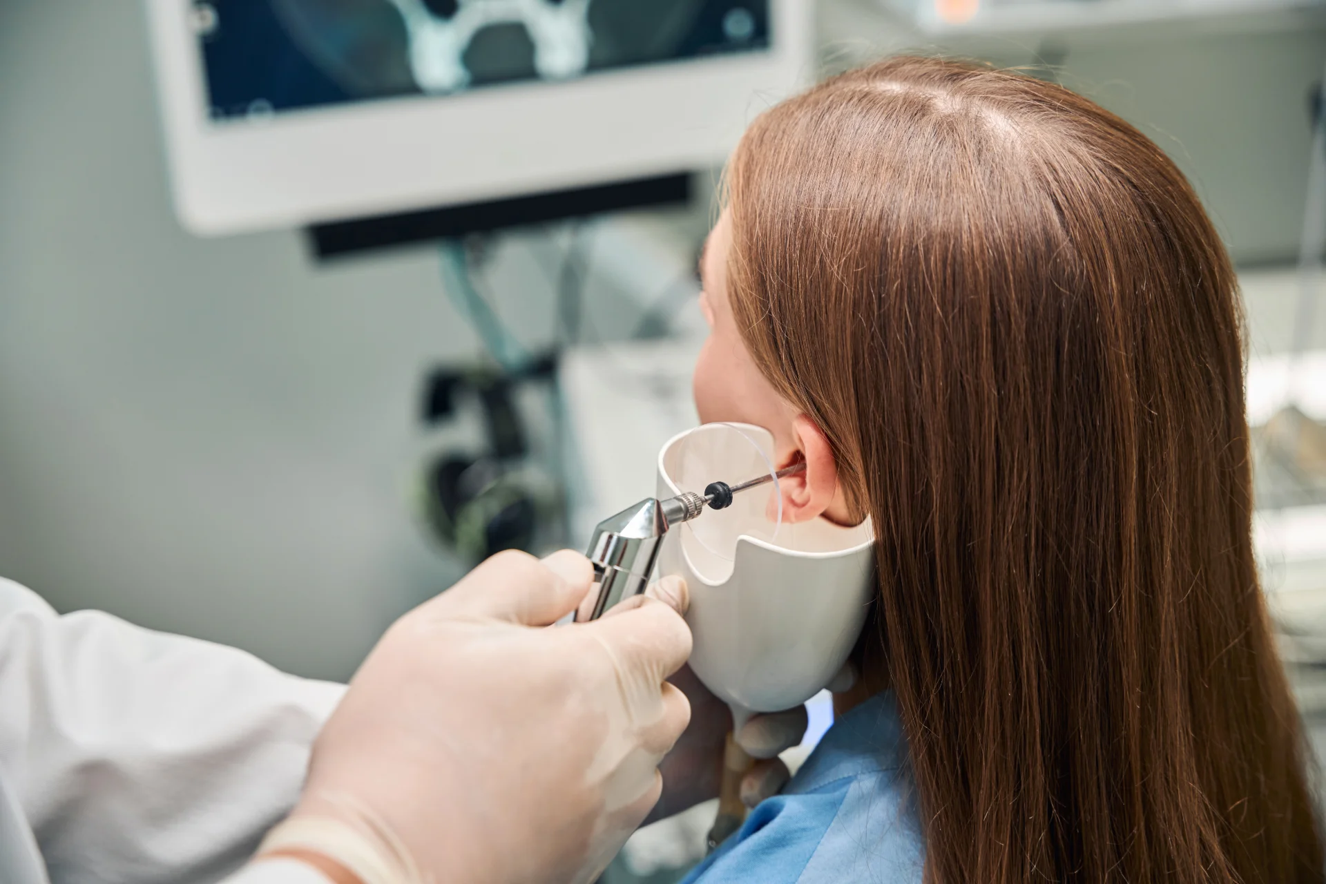 close up of ear examination with medical device 2026 03 20 02 01 57 utc